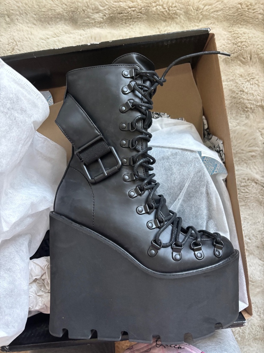 Demonia black colored traitor boot platform heel